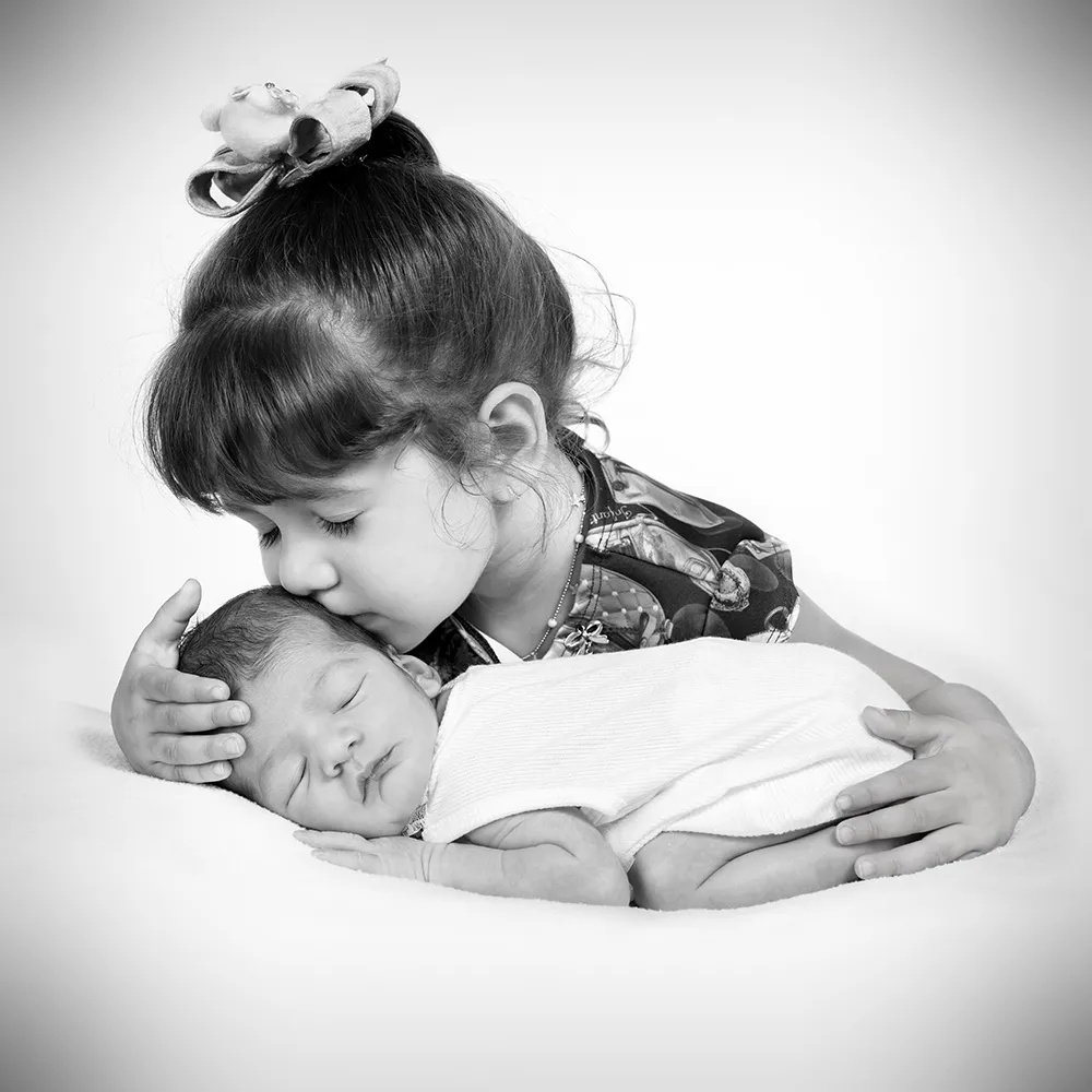 Newborn & sibling Image.